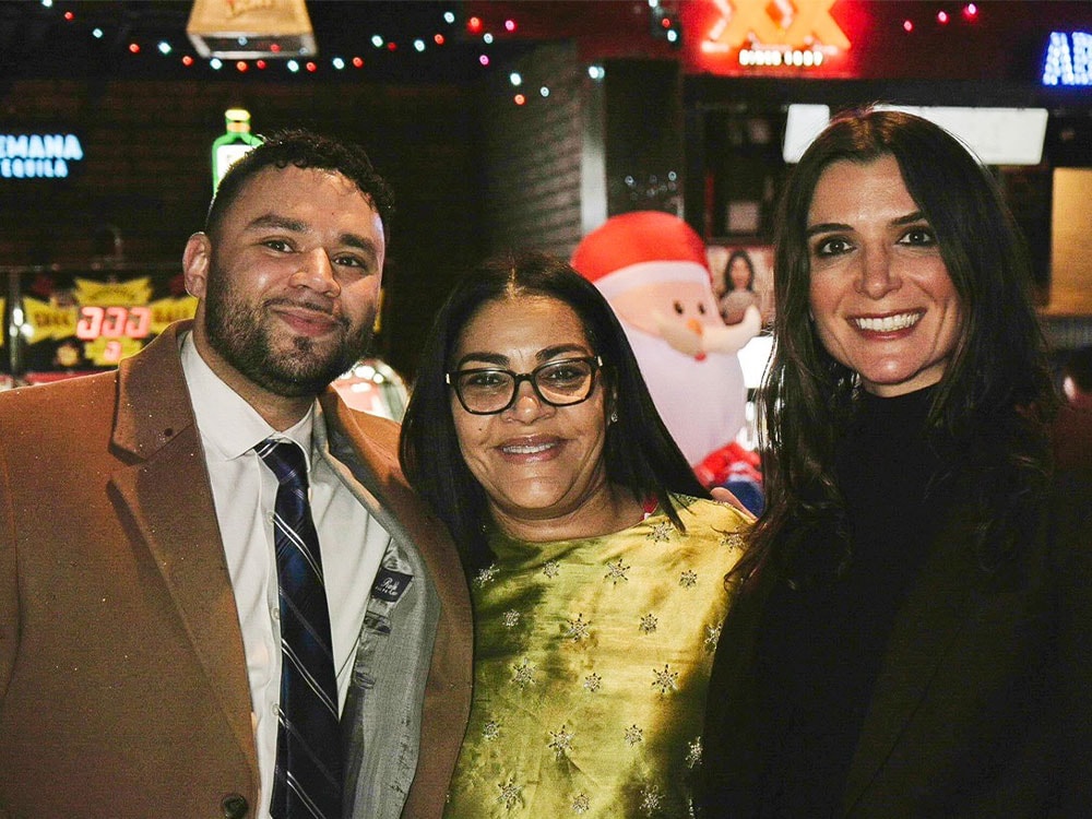 Diane Russell with supporters during a holiday party